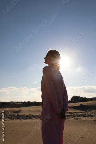 Young woman enjoying sunny weather on the beach. Fashion and outdoor. © face_reader_img