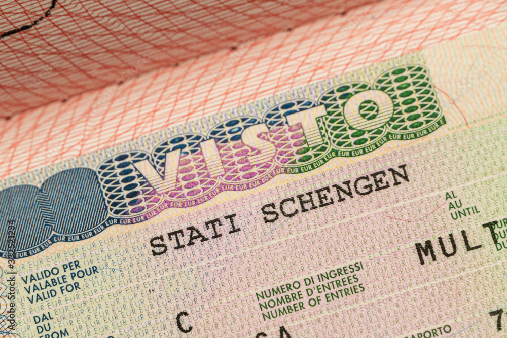 Fototapeta premium Close up Schengen visa in the passport. closed border of EC