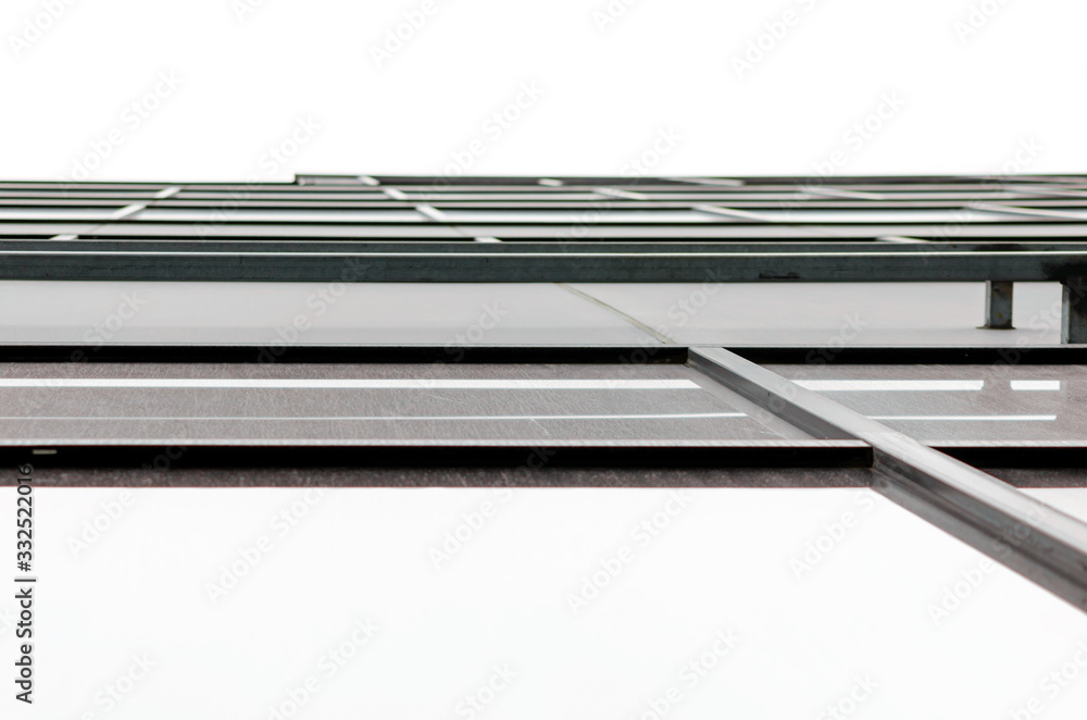 fragment of the wall and windows of a modern tall office building