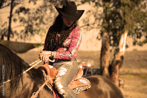 young woman on a horse 