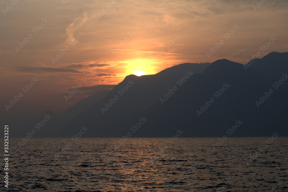 sunset over the lake,sun, landscape, nature,mountain, cloud, orange,beautiful,evening,  