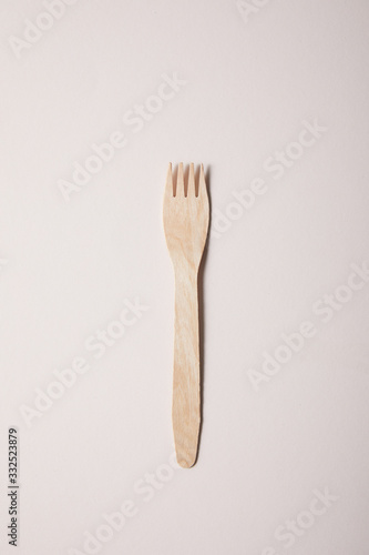fork isolated on beige background