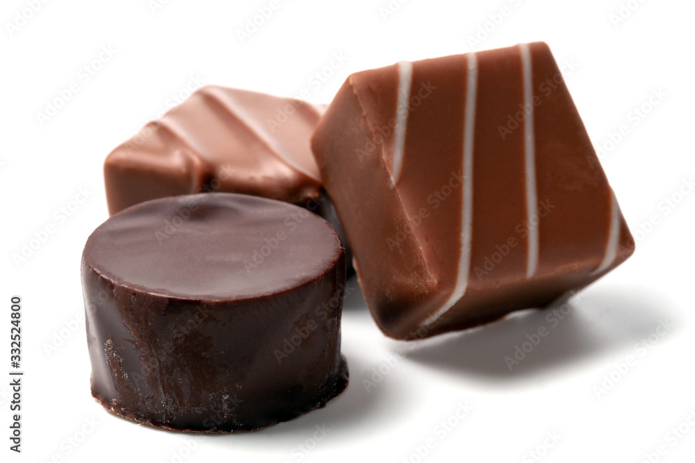 Composition of natural chocolates on a white background. Composition of natural chocolates on a white background.