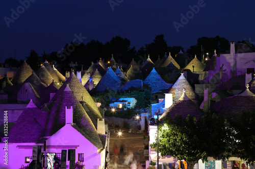 Night View of typical trulli houses in Alberobello Italy