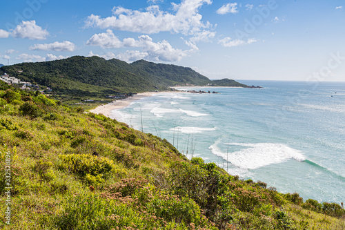 Fototapeta Naklejka Na Ścianę i Meble -  A view of Praia Mole (Mole beach) and Galheta  - popular beachs in Florianopolis, Brazil