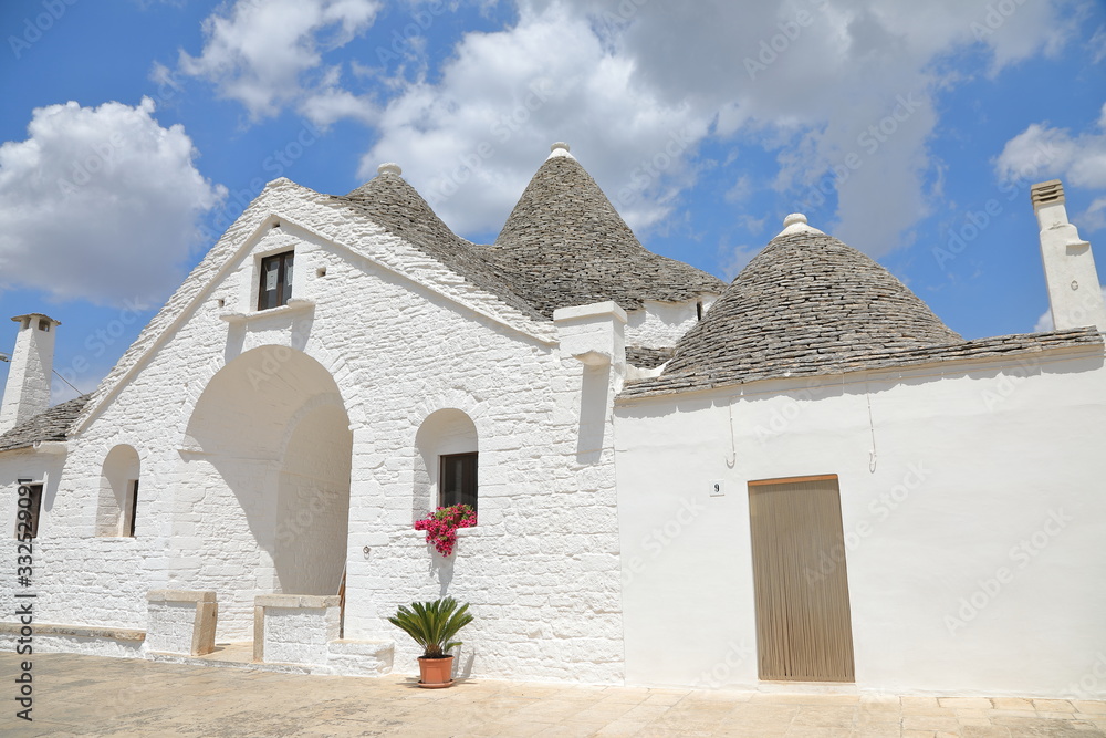 Cityscape of typical trulli houses in Alberobello Italy