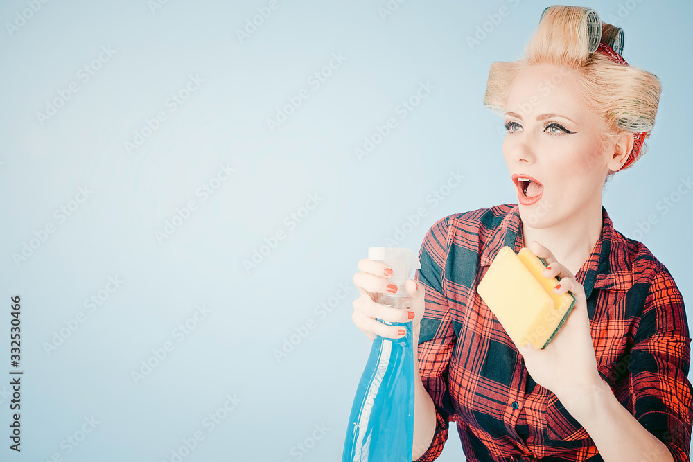 Portrat of af  a Pin up Young girl with cleaning product