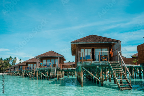 Maldives tropical Island, beautiful isolated luxury water bungalows Maldives in the blue green ocean of the maldives
