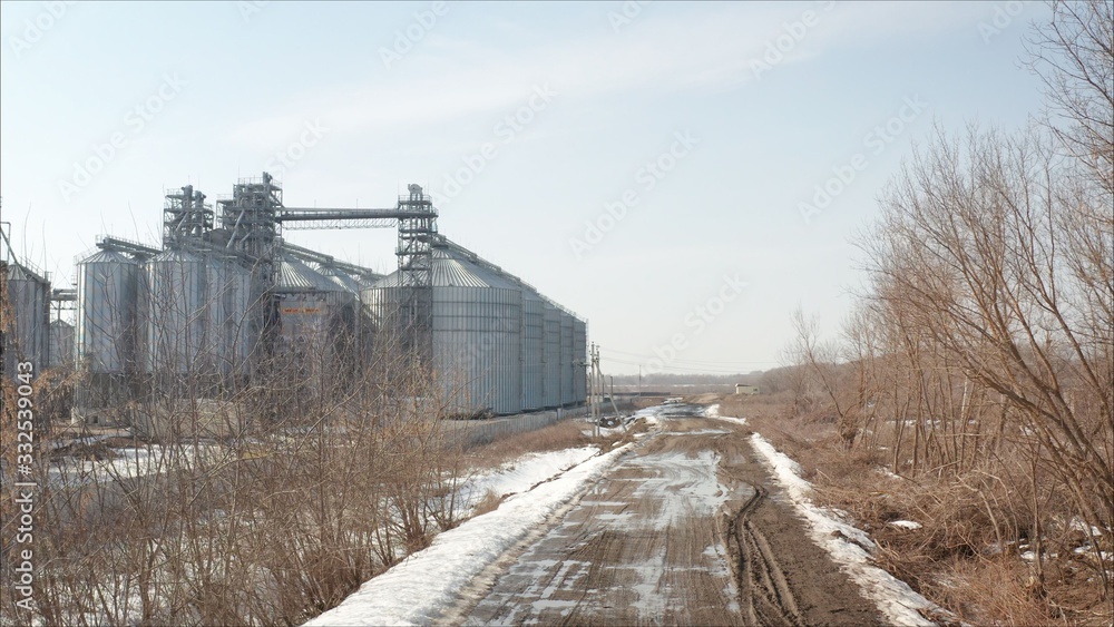 Industrial elevator, top view. High angle aerial view of industrial elevators and dryers in Russia Industrial elevator, top view. High angle aerial view of industrial elevators and dryers in Russia