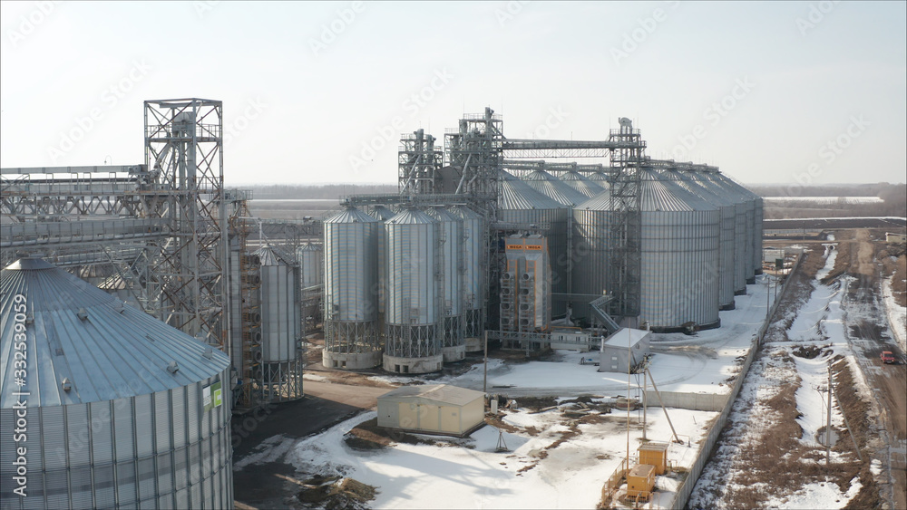 Industrial elevator, top view. High angle aerial view of industrial elevators and dryers in