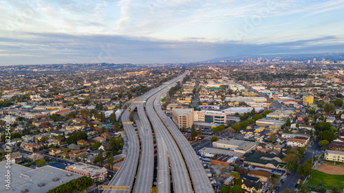 Aerial view of empty freeway streets with no people in downtown Los Angeles California USA due to coronavirus pandemic or COVID-19 virus outbreak and quarantine photo