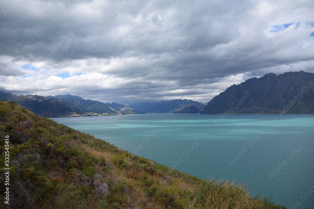 cloudy day over lake Pukaki in New Zealand