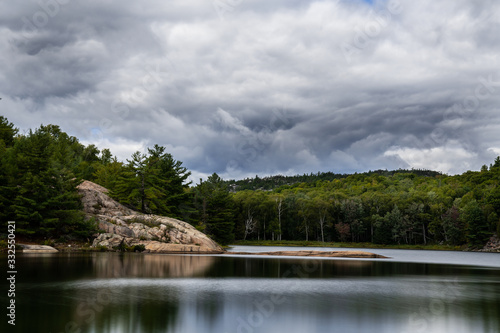 large rock cliffs of George Lake Killarney Park Ontario Canada