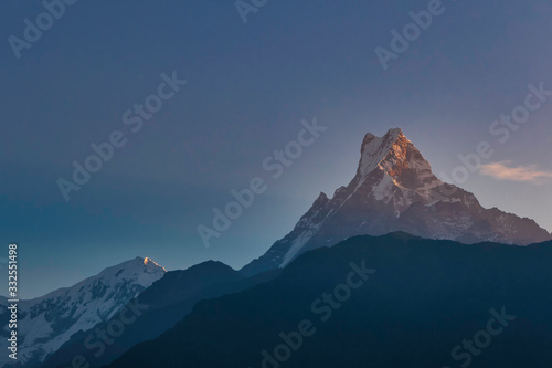 Mount Machhapuchhre or Fishtail in the Himalayas in Nepal.We can see the peak of Machhapuchhre along the way between the walking path to the Annapurna Base Camp.