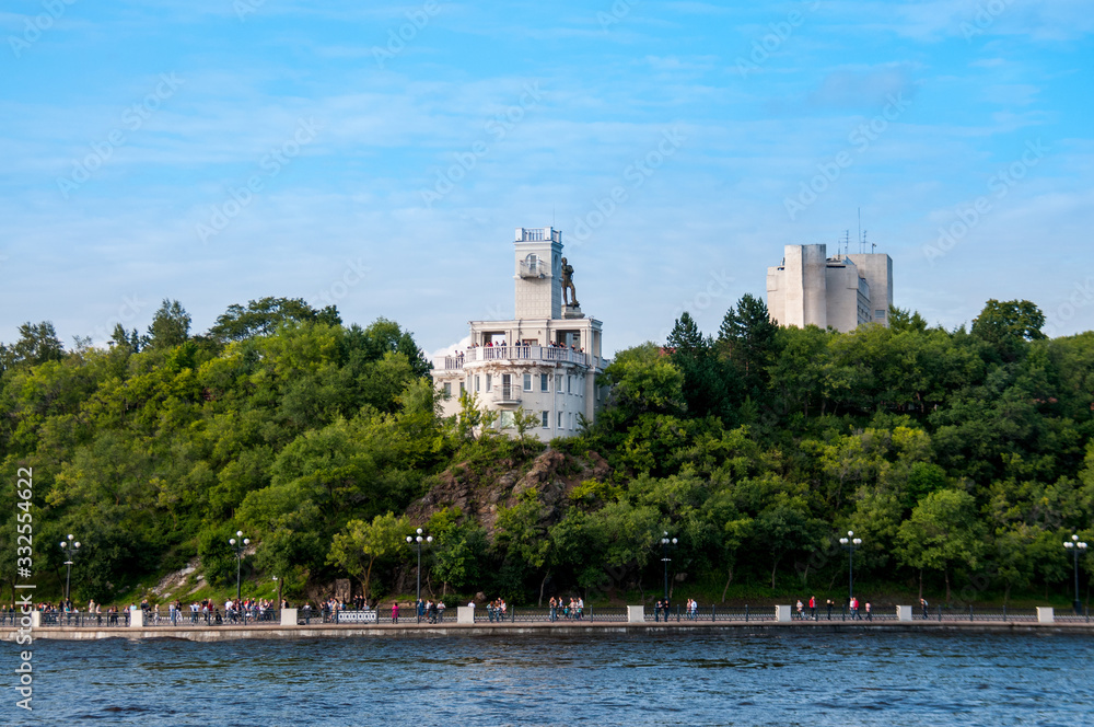 Russia, Khabarovsk, August 2019: the cliff Building and the monument to Muravyov-Amursky on the Bank of the Amur river in the city of Khabarovsk in the summer