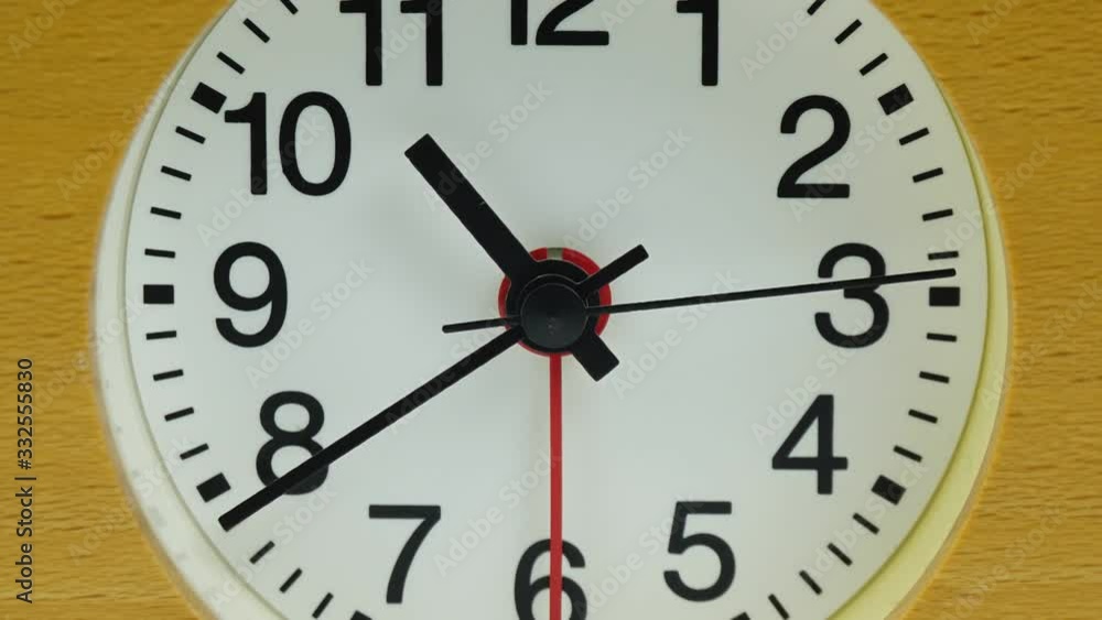 Closeup Zoom out, Alarm clock on white background, Time lapse moving fast, Time concept. Closeup Zoom out, Alarm clock on white background, Time lapse moving fast, Time concept.