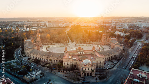 Aerial view of Plaza de Espana famous decoration with ceramic tiles, Seville (Sevilla), Andalusia, Spain.Sunset on Spain Square.Landmark square with a large water feature and ornate pavilion