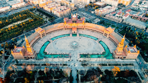 Aerial view of Plaza de Espana famous decoration with ceramic tiles, Seville (Sevilla), Andalusia, Spain.Sunset on Spain Square.Landmark square with a large water feature and ornate pavilion