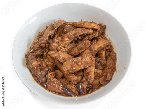 The close up of Thai fried chicken with garlic and pepper in white bowl on white background.