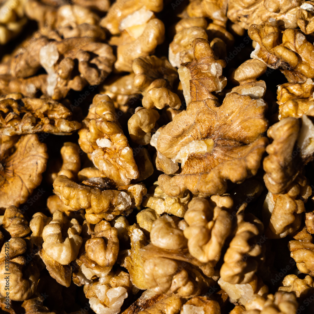Closeup of big shelled walnuts pile Closeup of big shelled walnuts pile