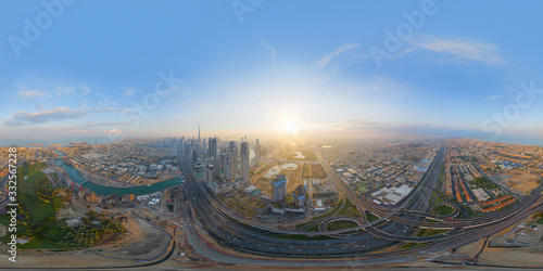 Photography 360 panorama by 180 degrees angle seamless panorama of aerial view of Dubai Downtown skyline and highway, United Arab Emirates or UAE