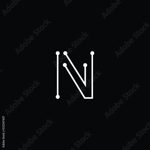 Minimal elegant monogram art logo. Outstanding professional trendy awesome Technology N NV VN initial based Alphabet icon logo. Premium Business Technology logo White color on black background