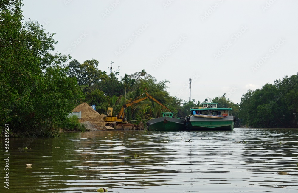 construction area at a natural river in vietnam construction area at a natural river in vietnam