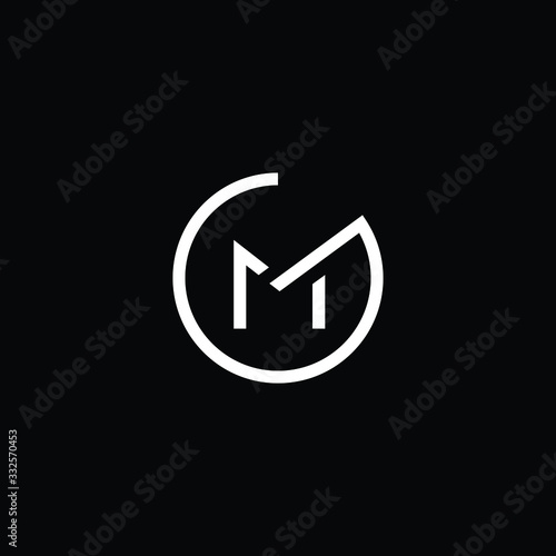 Minimal elegant monogram art logo. Outstanding professional trendy awesome artistic GM MG initial based Alphabet icon logo. Premium Business logo White color on black background