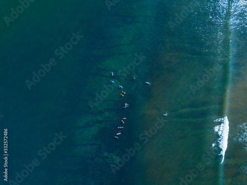 Aerial view of group of surfers, Bali, Indonesia