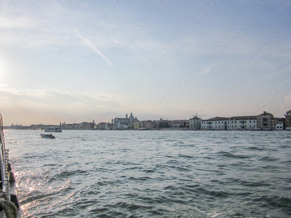 A shot of grand canal of Venice with ferries floating in it