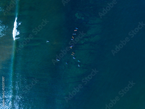 Aerial view of group of surfers, Bali, Indonesia