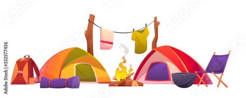 Camping equipment set. Tents, burning campfire, backpack, rolled sleeping bag, boiler, chair and clothing hanging on rope for drying isolated on white background. Hiking cartoon vector illustration