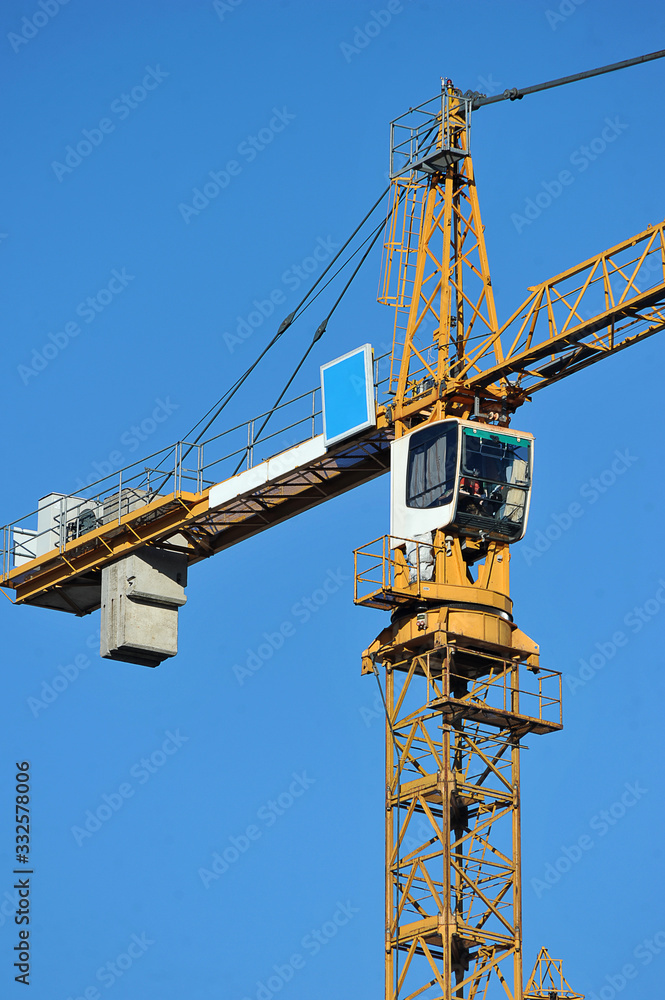 construction crane cabin close up against the blue sky construction crane cabin close up against the blue sky