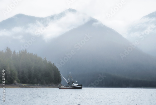 Commercial fishing boat in Southeast Alaska in fog © mscornelius