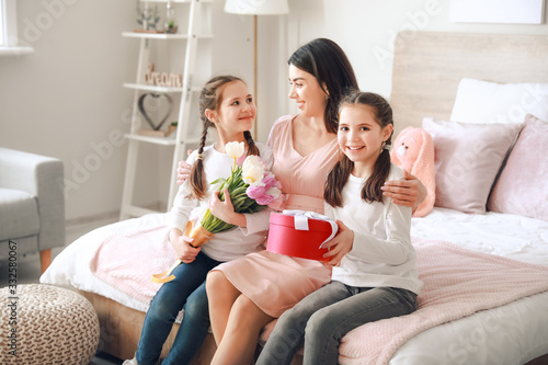 Little girls greeting their...