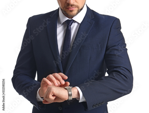 Businessman with watch on w...
