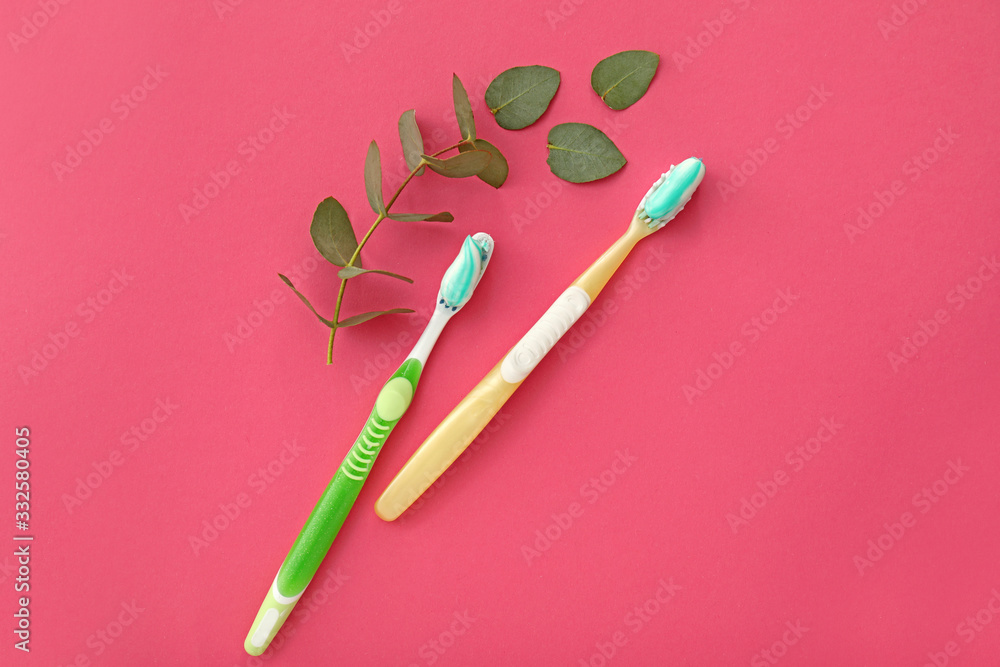 Tooth brushes with paste on color background Tooth brushes with paste on color background