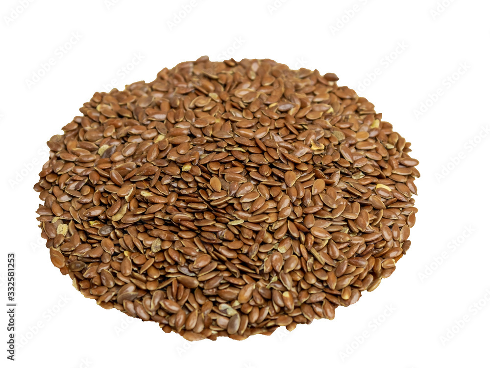 Flax seeds in a glass plate on a wooden background Flax seeds in a glass plate on a wooden background