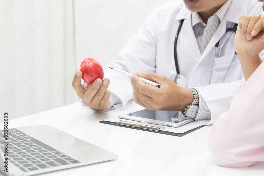 Doctors are encouraging patientson doctors table in hospital. to have the power to fight off illness. Doctors are encouraging patientson doctors table in hospital. to have the power to fight off illness.
