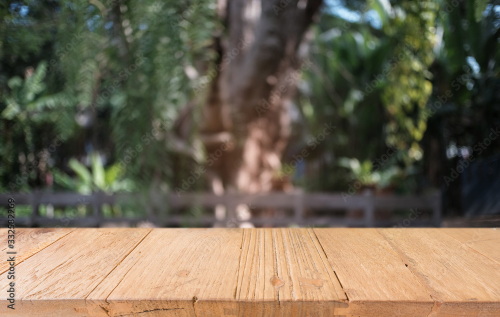 Empty dark wooden table in front of abstract blurred bokeh background of restaurant . can be used for display or montage your products.Mock up for space. Empty dark wooden table in front of abstract blurred bokeh background of restaurant . can be used for display or montage your products.Mock up for space.
