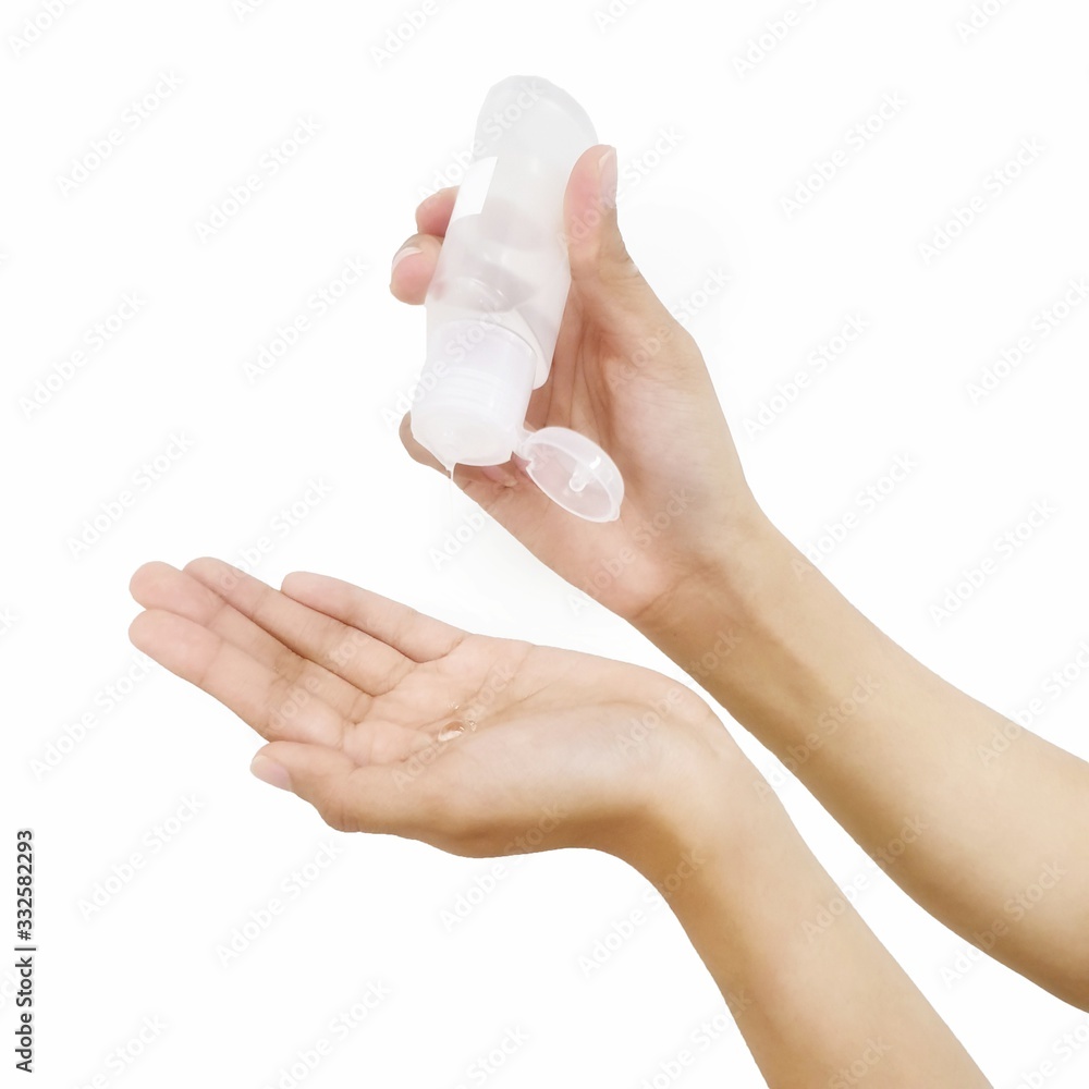 Women's hands using gel pump dispenser on white background. Women's hands using gel pump dispenser on white background.