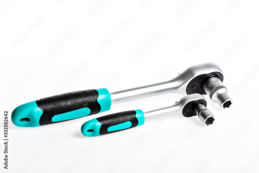 Steel made with no skid threaded handle you can hold them firmly without slipping. Socket spanner wrenches white background. Knob for socket wrench nut ratchet close up. Ratchet wrench. Ratchet tool Steel made with no skid threaded handle you can hold them firmly without slipping. Socket spanner wrenches white background. Knob for socket wrench nut ratchet close up. Ratchet wrench. Ratchet tool