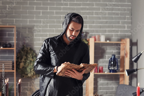 Male alchemist with spell b...