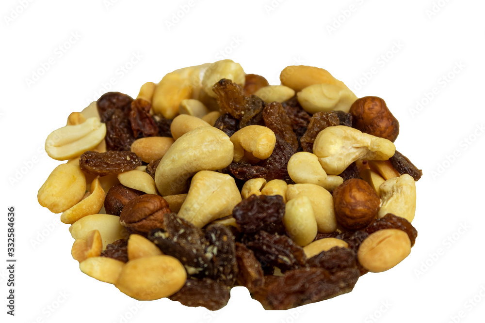 Raisins and nuts scattered on a wooden background Raisins and nuts scattered on a wooden background