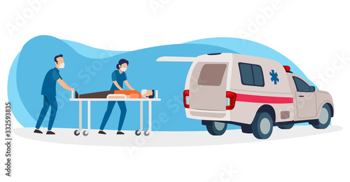 Two nurses will insert a patient who is positive for corona virus into the ambulance photo