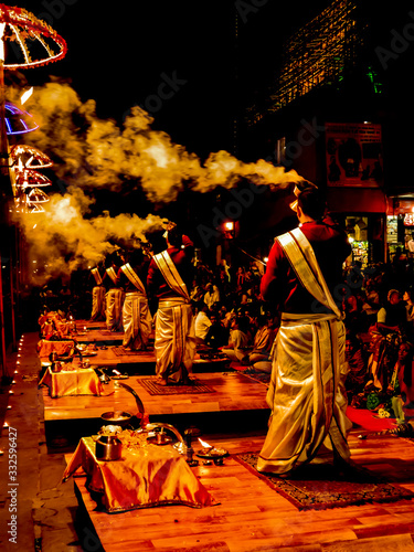 Tableau sur toile Varanasi, Uttar pradesh, India-02/21/2020: Some Brahman priest wearing red and y