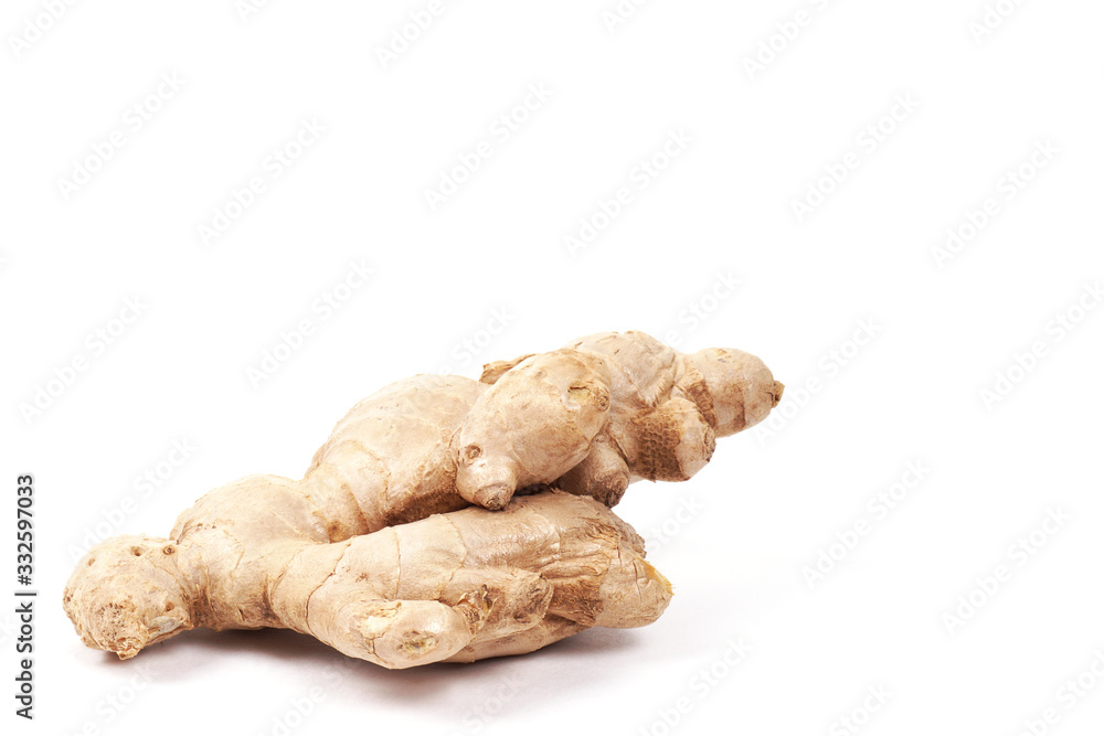 Ginger root isolated on a white background. Seasoning in the kitchen. Side view. Ginger root isolated on a white background. Seasoning in the kitchen. Side view.
