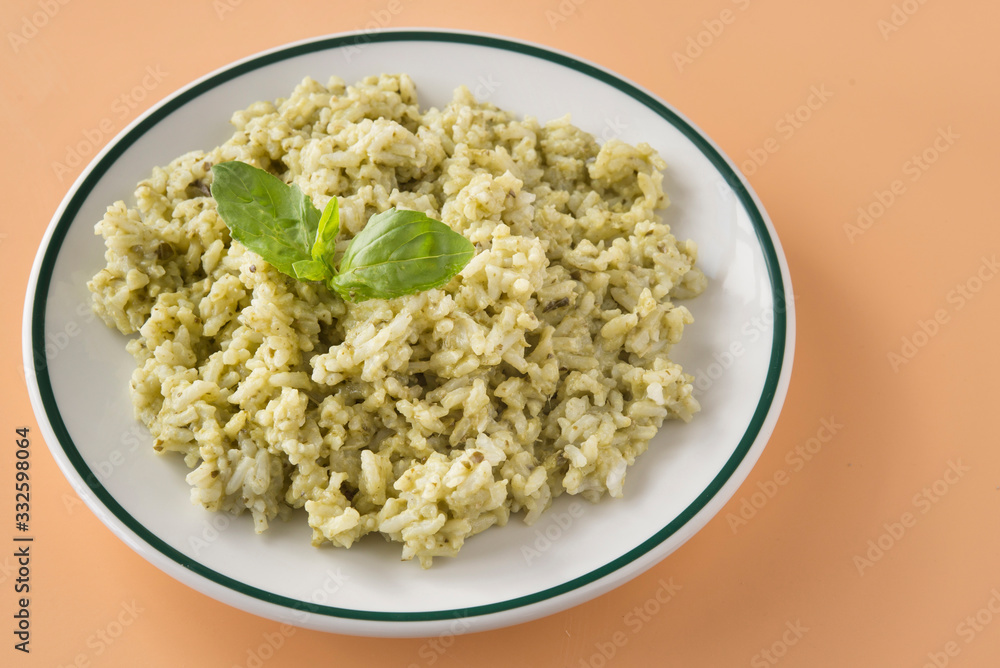 Traditional Mexican Arroz Verde green rice dish made of long-grain rice, spinach, cilantro and garlic Traditional Mexican Arroz Verde green rice dish made of long-grain rice, spinach, cilantro and garlic
