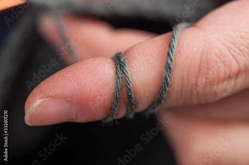 Woman hands knitting crochet.Crochet hook