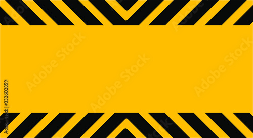 warning sign with black stripes on yellow background.